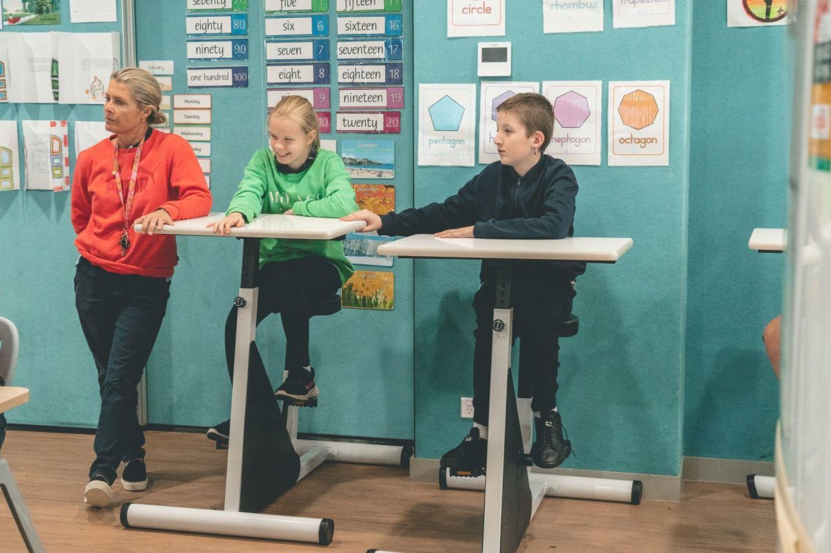 Students using pedal desks in the classroom
